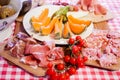 Typical Tuscany cuisine with prosciutto, cheese and fruit. Royalty Free Stock Photo
