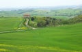 Typical Tuscany landscape with a farmhouse Royalty Free Stock Photo