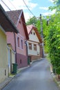 Typical urban landscape. House and street in Schei cvartal in south of the city Brasov, Transylvania Royalty Free Stock Photo