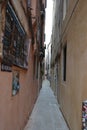 typical venetian Engelgasse where only one person can fit through in Venice Italy