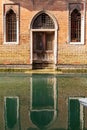 Typical venetian style door and windows in Venice, Italy Royalty Free Stock Photo