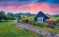 Typical view of Icelandic turf-top houses. Splendid summer sunrise on Skogar village. Fantastic morning scene of Iceland, Europe.