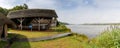 Typical Viking Long House with a reconstructed boat on the banks of the River Slaney in the Irish National Heritage Park