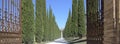 Typical villa in the Italian countryside. Road with cypresses Royalty Free Stock Photo