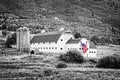 Typical vintage american barn with american flag, Park City, Utah - Black and white photography, selective color Royalty Free Stock Photo