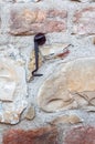 Typical wall made of stones and bricks of ancient Italian house Royalty Free Stock Photo