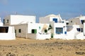 Typical white beach houses in Caleta Famara, Lanzarote, Spain