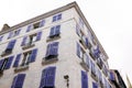 Typical white and blue house Bayonne facades in the South West of France Royalty Free Stock Photo