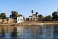 Typical white houses of a Nubian village surrounded by palm trees near Cairo Egypt and on the banks Royalty Free Stock Photo