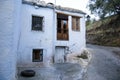 Typical whitewashed house in the Alpujarra seen during the route through the Taha de Pitres in autumn Royalty Free Stock Photo