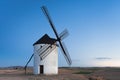 Typical windmill in with the moon at the background Royalty Free Stock Photo
