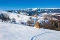 Typical winter scenic view with hayracks