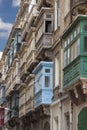 Typical wooden balcony on old building in capital of Malta, Valletta Royalty Free Stock Photo