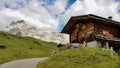 Typical wooden mountain hut in the Swiss Alps with Sulzfluh in the background. Royalty Free Stock Photo