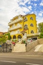 Typical yellow residential apartment hotel building Crikvenica Croatia Royalty Free Stock Photo