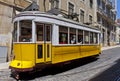 Typical yellow tram on the street of Lisbon, Portugal Royalty Free Stock Photo