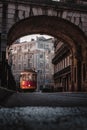 Typical yellow tram in the streets of Lisbon, Portugal in the evening Royalty Free Stock Photo