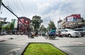 Typically Asian street busy with motor cycles and cars heading in all direction in Saigon or Ho Chi Min City