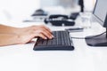 Typing on keyboard. Closeup of business womans hand typing on computer keyboard. Royalty Free Stock Photo