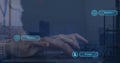 Typing on keyboard, person interacting with AI prompts and responses on screen