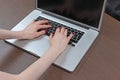 Typing on laptop keyboard Royalty Free Stock Photo