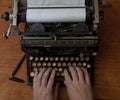 Typing on an old typewriter Royalty Free Stock Photo