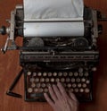 Typing on an old typewriter Royalty Free Stock Photo