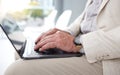 Typing, senior and laptop with hands of man in waiting room for job interview, information and search. Application Royalty Free Stock Photo