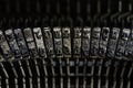 Letters and numbers in the typo keys of a old qwerty typewriter