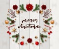 Typographic composition of christmas Postcard with vintage label and Christmas wishes decorated with Festive Elements.