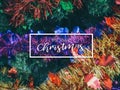 Typographical Merry Christmas Banner. Colorful Christmas background with Christmas prop decoration on Christmas tree