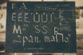 Typography lesson with blackboard with handwritten chalk letters