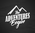 Typography lettering compositin of The Adventures Begins on chalkboard background Royalty Free Stock Photo