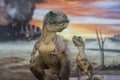 Tyrannosaurus rex with baby t-rex with cretaceous land in the background