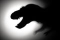 Tyrannosaurus shadow in dark space