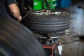 Tyre change - wheel balancing or repair and change car tire Royalty Free Stock Photo
