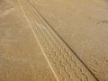 Tyre Marks on Beach Sand Royalty Free Stock Photo