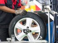 Tyre Service by Mechanic Royalty Free Stock Photo