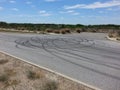 Tyre tire Skid marks on bitumen road Royalty Free Stock Photo