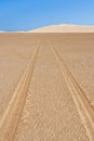 Tyre tracks in the desert Royalty Free Stock Photo