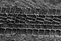 Tyre tracks on sand. Royalty Free Stock Photo