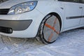 tyres by car instead of socks to use snow chains for running safe Royalty Free Stock Photo
