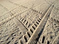 Tyres prints in sand