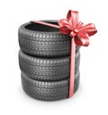 Tyres with a red ribbon. Present. 3D Icon Royalty Free Stock Photo