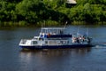 Tyumen, Russia, on August 16, 2018: The small Admiral motor ship with tourists onboard, floats down the river Tura in Tyumen