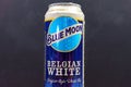 Tyumen, Russia-December 23, 2020: Blue Moon can belgian white beer, brewed by MillerCoors. selective focus