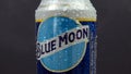 Tyumen, Russia-December 23, 2020: Blue Moon can belgian white beer, brewed by MillerCoors. selective focus