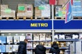 Tyumen, Russia-February 25, 2023: Metro logo of a supermarket. Metro cash and carry is a leading international company