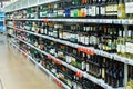 Tyumen, Russia-January 5, 2020: shelves with alcohol on the shelves of the Auchan hypermarket. a large selection of alcoholic Royalty Free Stock Photo