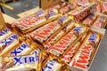 Tyumen, Russia-January 26, 2023: Twix candy bars xtra. Illustrative editorial photography. Blurred shelf of grocery